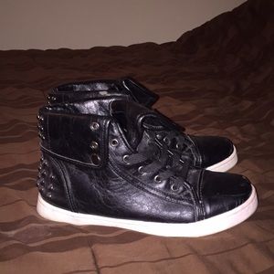 Black high top sneakers